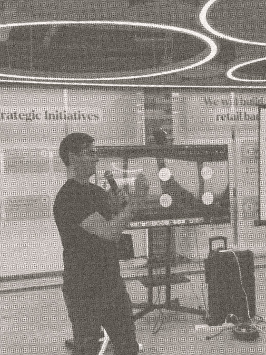 An Origami facilitator presenting to a client team in front of a shared screen