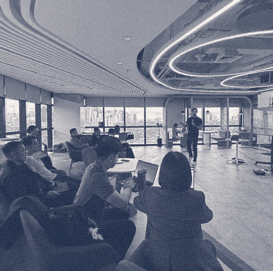 A workshop in progress in Origami's Manila studio, overlooking the city skyline